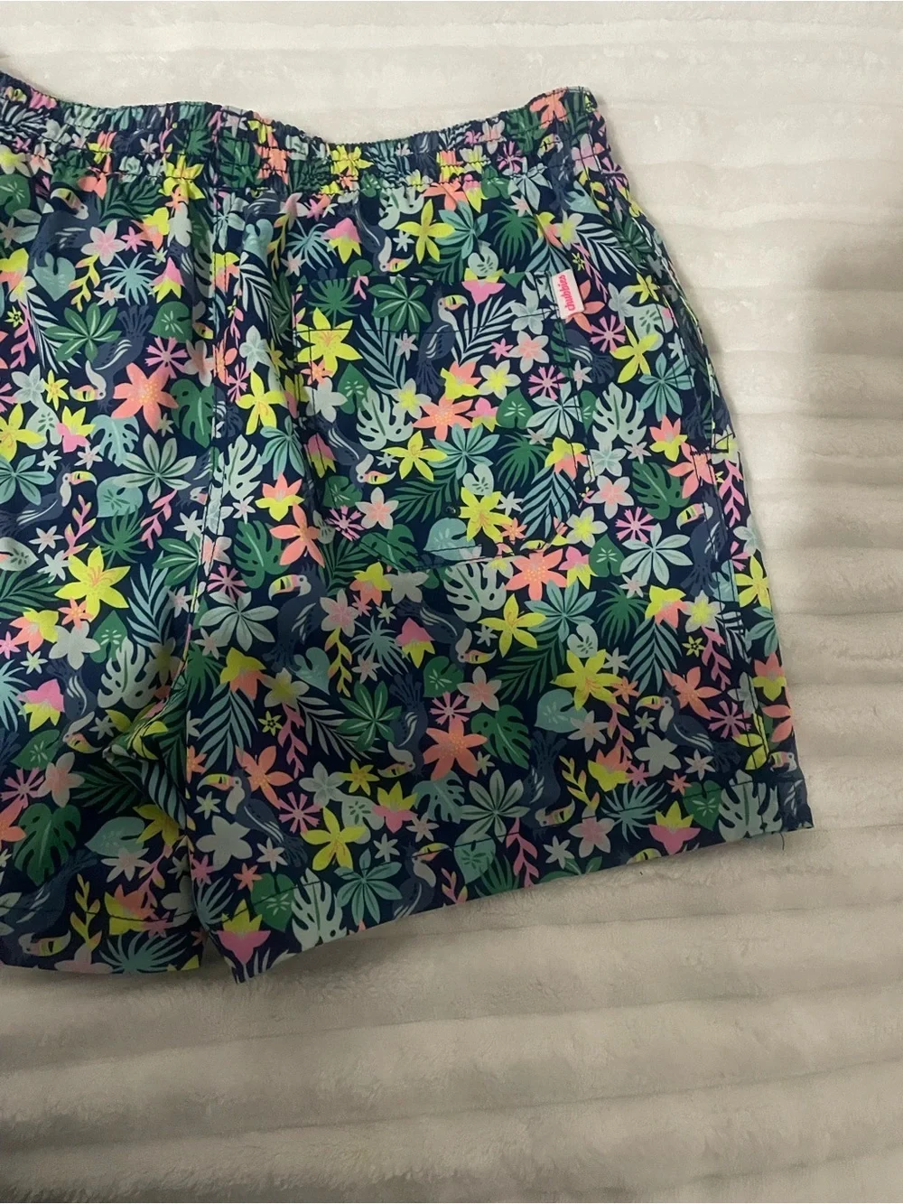 chubbies Black Tropical Floral Swim Trunks with Multicolor Print